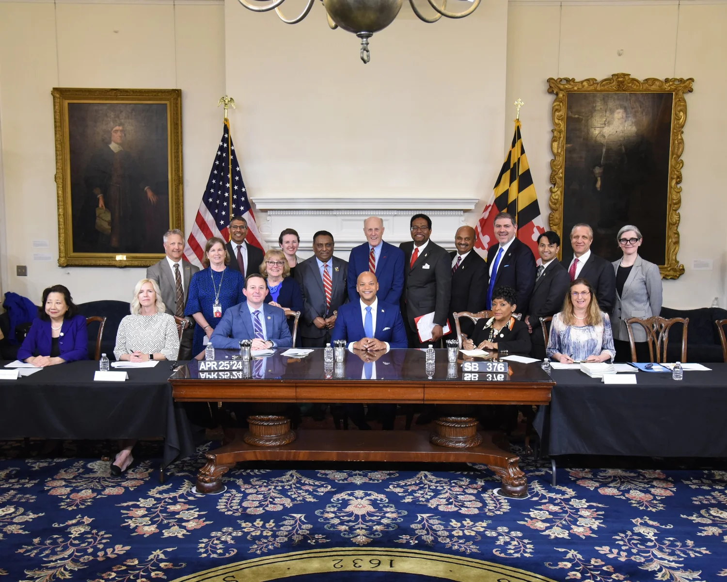 Image of legislators and leaders at passage of SB376