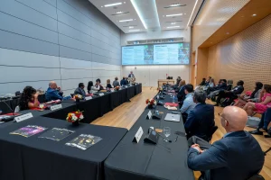 Adam Porter discusses UM-IHC’s mission at meeting with state, academic and business leaders on June 10, 2025.