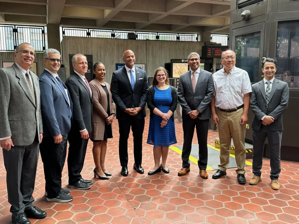UM-IHC faculty with Gov. Wes Moore (center) at the North Bethesda Metro Station announcement on May 27, 2025