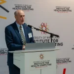 Speaker at the UM-IHC second anniversary ribbon cutting ceremony