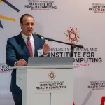 Speaker at the UM-IHC second anniversary ribbon cutting ceremony