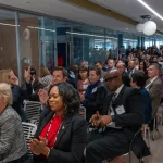Attendees at the UM-IHC second anniversary ribbon cutting ceremony
