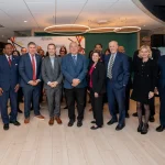 Attendees at the UM-IHC second anniversary ribbon cutting ceremony