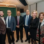 Attendees at the UM-IHC second anniversary ribbon cutting ceremony