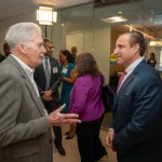 Attendees at the UM-IHC second anniversary ribbon cutting ceremony