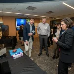Attendees at the UM-IHC second anniversary ribbon cutting ceremony