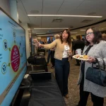 Attendees at the UM-IHC second anniversary ribbon cutting ceremony
