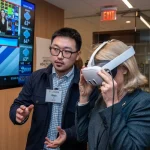 Attendees at the UM-IHC second anniversary ribbon cutting ceremony