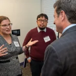 Attendees at the UM-IHC second anniversary ribbon cutting ceremony