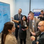 Attendees at the UM-IHC second anniversary ribbon cutting ceremony