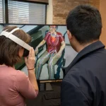 Attendees at the UM-IHC second anniversary ribbon cutting ceremony