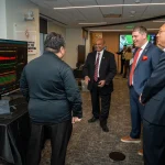 Attendees at the UM-IHC second anniversary ribbon cutting ceremony