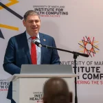 Speaker at the UM-IHC second anniversary ribbon cutting ceremony