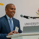 Speaker at the UM-IHC second anniversary ribbon cutting ceremony