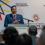 Speaker at the UM-IHC second anniversary ribbon cutting ceremony