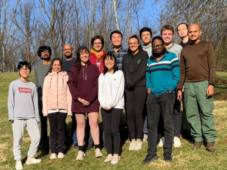 Pratyush Tiwary (back row, second from left) and his research team
